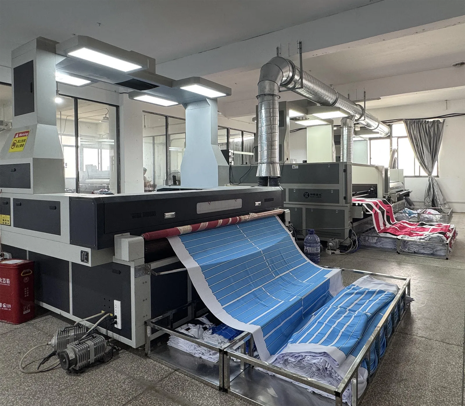 Production floor — automated cutting and printing lines